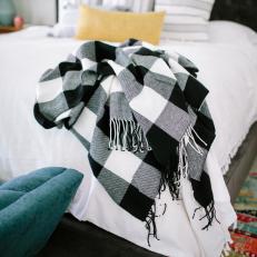 Black and White Plaid Throw on Bed