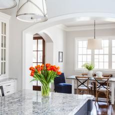 White Open Plan Transitional Kitchen With Tulips