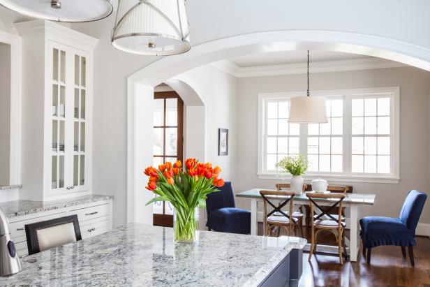 White Kitchen With Orange Tulips