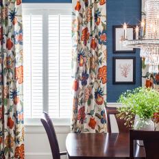 Blue Traditional Dining Room With Floral Curtains