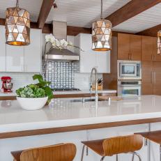 Midcentury Modern Kitchen With Geometric Pendants
