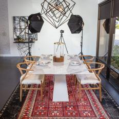 Eclectic Dining Room With Red Rug
