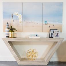 Coastal Entryway With Beach Artwork, Gold Accents