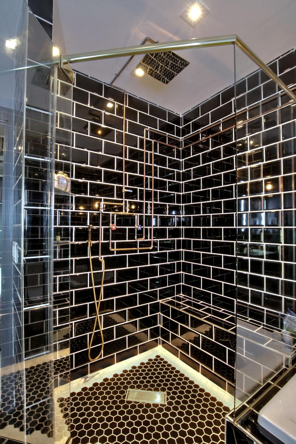 Black Tile Shower With Exposed Copper Pipes Creates Steampunk Style | HGTV