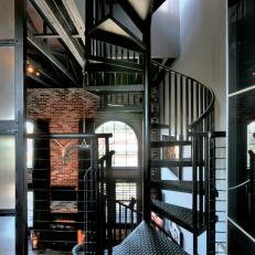 Three-Story Spiral Staircase Saves Room in Townhome