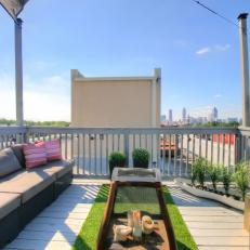 Roof Deck With Pink Striped Pillows