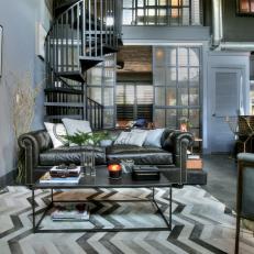 Gray Urban Living Room With Spiral Stairs