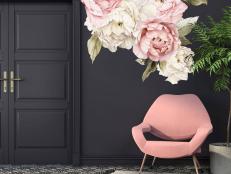 Pink armchair in a black interior