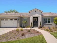 Front View of Neutral-Colored Ranch House With Half-Door Entryway