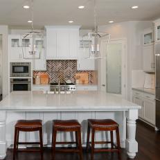 Oversized Island in White Transitional Kitchen