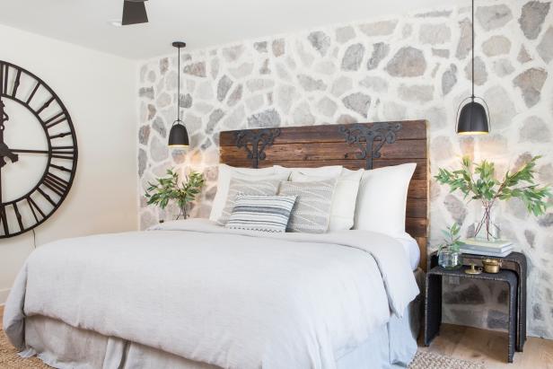 White Rustic Master Bedroom With Gray Stone Accent Wall Hgtv