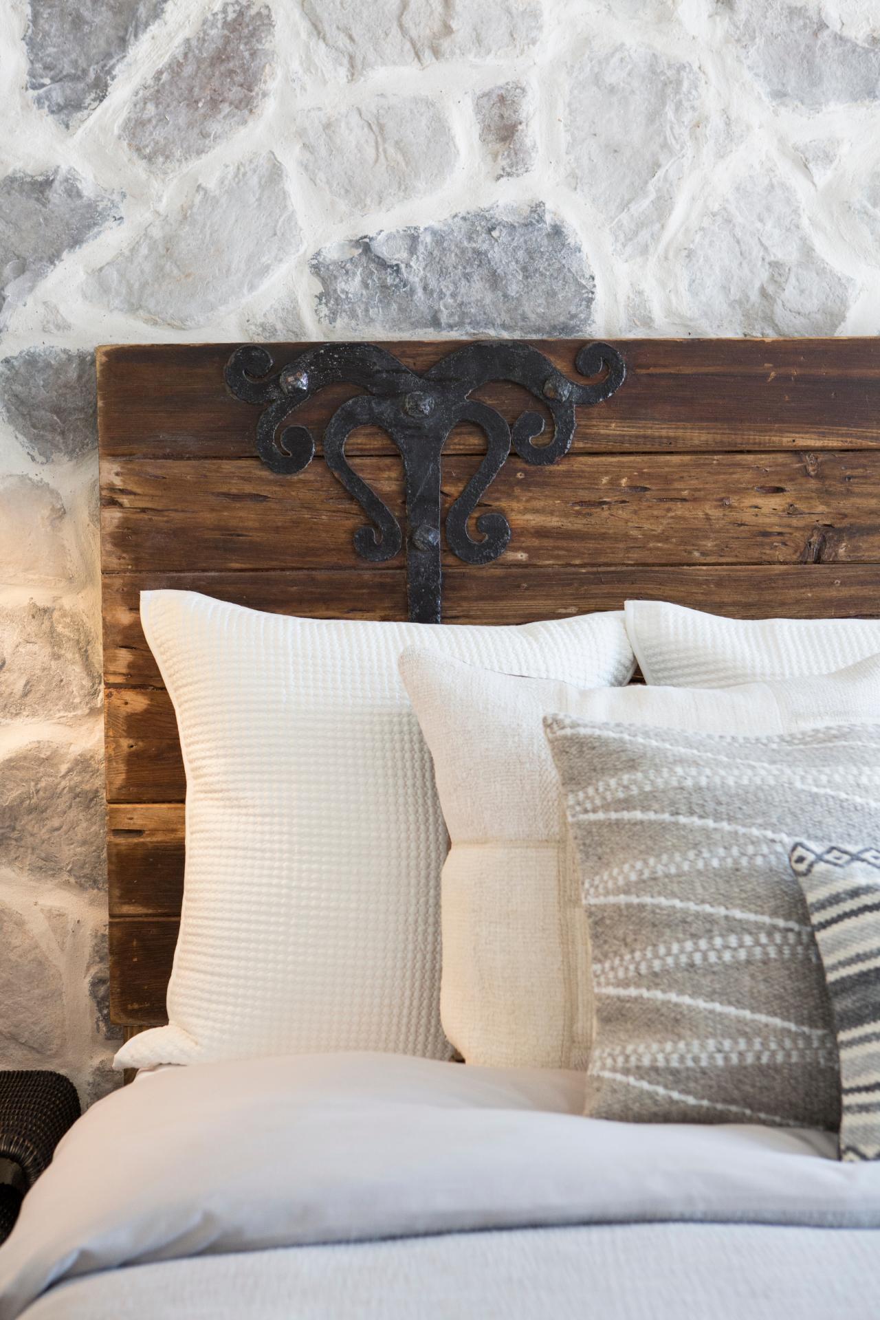 Rustic White Master Bedroom With White Throw Pillows Hgtv