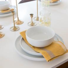 White Dining Table with White Dinnerware 
