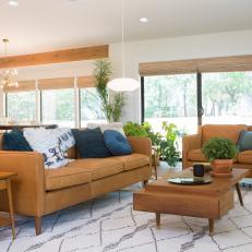 Neutral Midcentury Modern Living Room with Brown Leather Sofas 