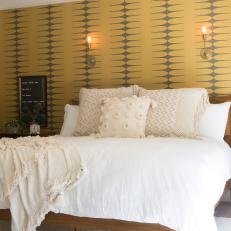 Neutral Midcentury Modern Master Bedroom with Yellow Accent Wall