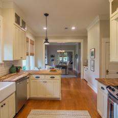 Neutral Craftsman Kitchen with Brown Hardwood Floor  