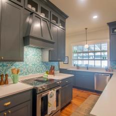 Contemporary Gray Kitchen with Blue and White Backsplash