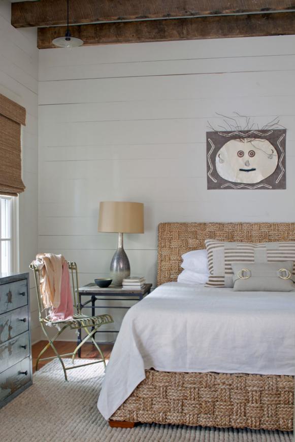 Woven Wicker Bed Frame in Guest Bedroom With Shiplap Walls