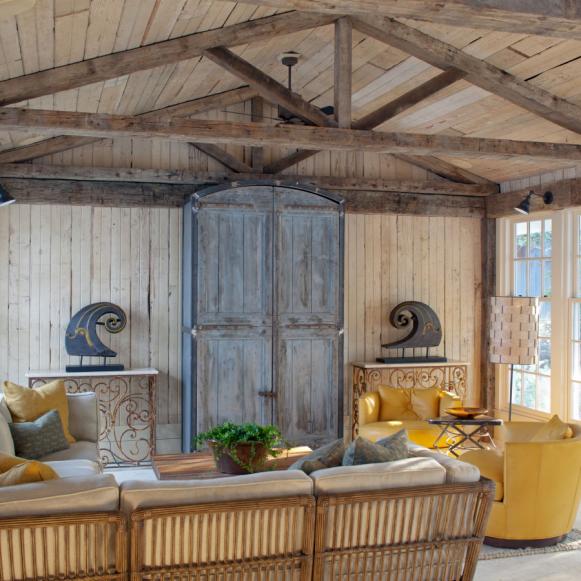 Living Room With Exposed Wood Beams and Vaulted Ceiling