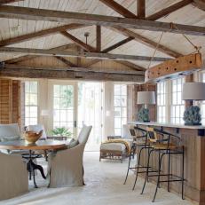 Neutral Coastal Great Room With Exposed-Beam Ceiling