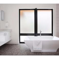 White Spa Bathroom With Brown Tile Floor