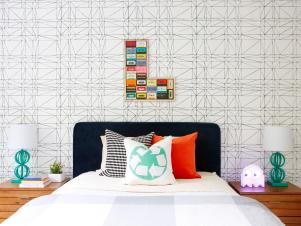 Multicolored Kid's Room With Graphic Wallpaper