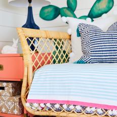 Boho-Chic Bedroom Features Patterned Pillows and Linens