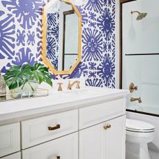Blue and White Bathroom With Graphic Wallpaper