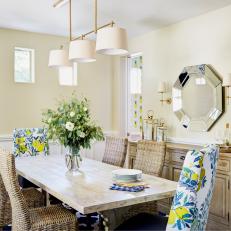 Neutral Transitional Dining Room With Wicker Chairs
