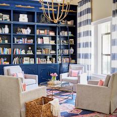 Blue and Pink Transitional Library With Striped Curtains
