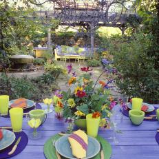 Purple Outdoor Dining Table With Bouquet