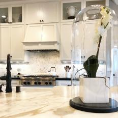 White Kitchen With Glass Cloche on Countertop