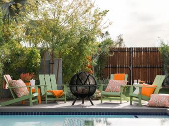 HGTV Spring House 2017: Green Adirondack chairs and black fire pit
