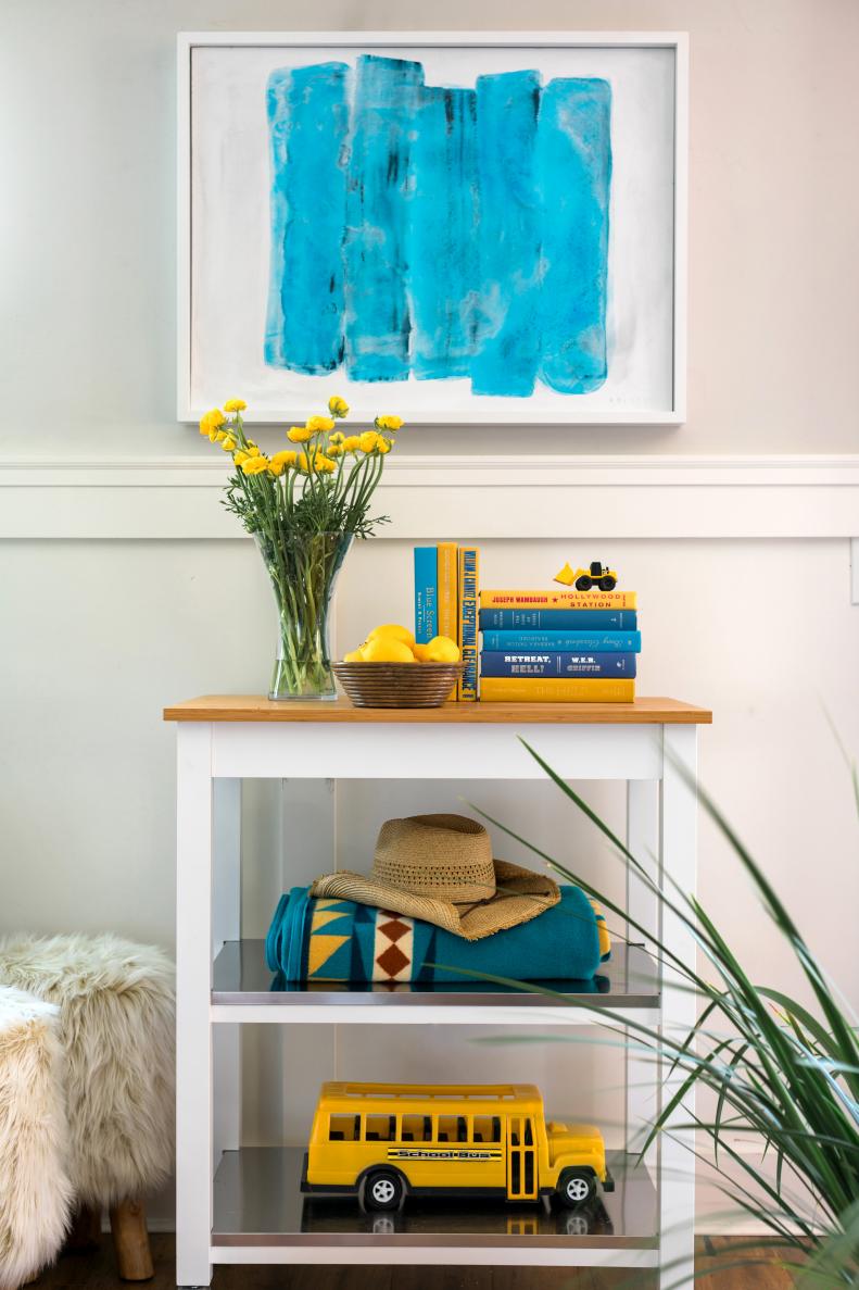 HGTV Spring House 2017: Blue Artwork Above Table With Yellow Flowers