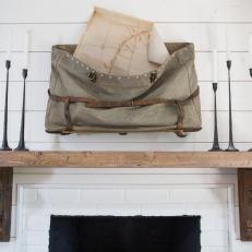 White Brick Fireplace with Wooden Mantel 