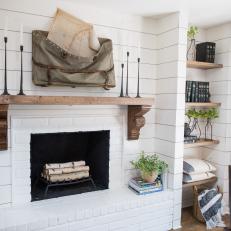 Rustic White Fireplace with Wooden Mantel 