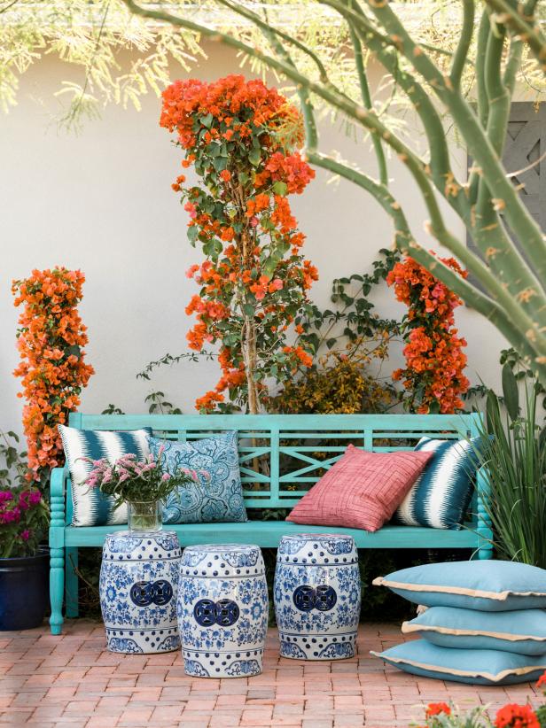 HGTV Spring House 2017: Teal garden bench with blue Asian stools