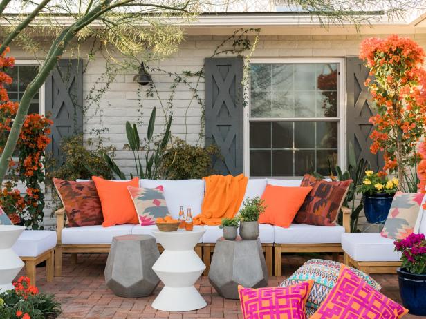 HGTV Spring House 2017: Orange and white courtyard with sectional sofa