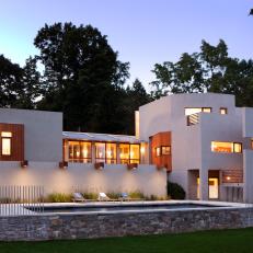 Modern Home's Exterior with Complimentary Natural Accents