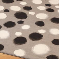 How to Add Painted Dots to an Outdoor Rug: Continue Painting Dots