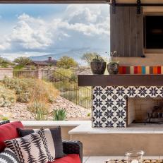 Southwestern Outdoor Living Space With Fireplace