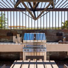 Southwestern Outdoor Kitchen With Contemporary Pergola