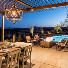 Contemporary Outdoor Dining Overlooks Sleek Pool