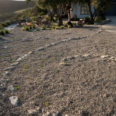Rustic California Backyard With Flagstone and Gravel Patio