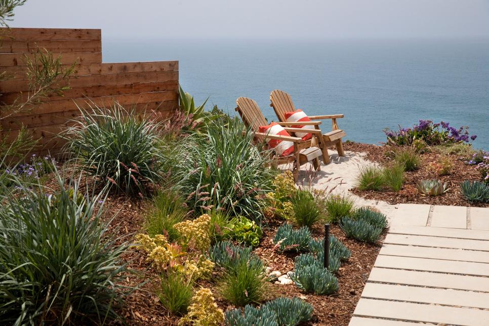 Contemporary Outdoor Sitting Area With Adirondack Chairs, Ocean View