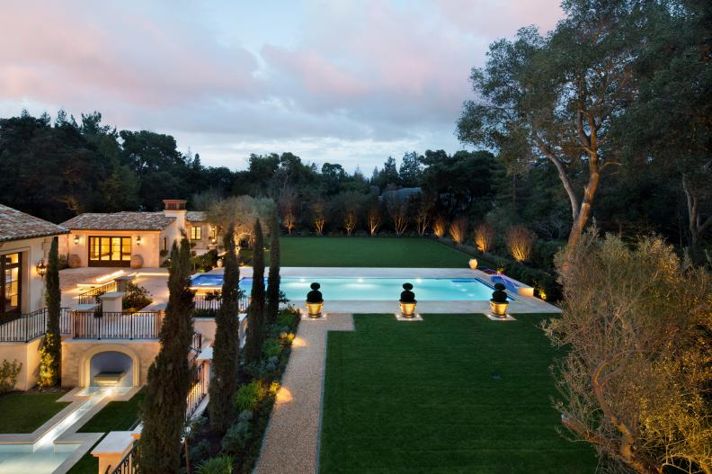Wide Shot of Mediterranean Exterior and Pool at Sunset