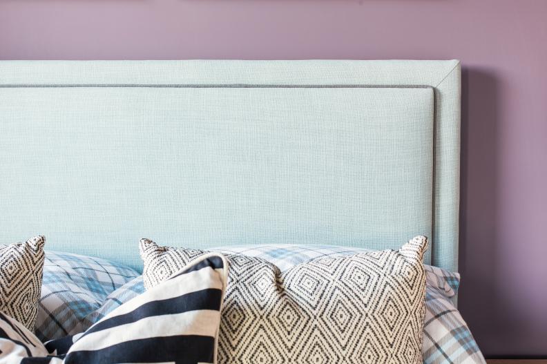 Beautiful blue-gray upholstered headboard with clean lines