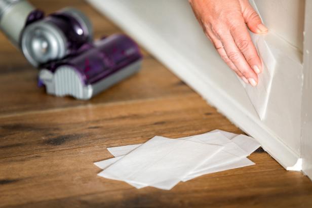 If you want to truly deep clean your home, you need to deal with those dusty baseboards. Go over them with a vacuum brush attachment or a stiff broom to blast the first layer of dust. Next, wipe them clean with a mixture of warm water and a splash of vinegar. Follow up by drying them off with a clean cloth, then swipe them with a dryer sheet, which will reduce dust in the future.