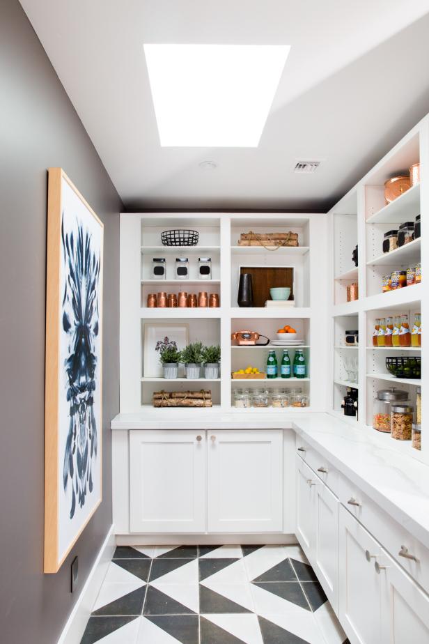 The pantry has quartz countertops and Shaker-style maple cabinets