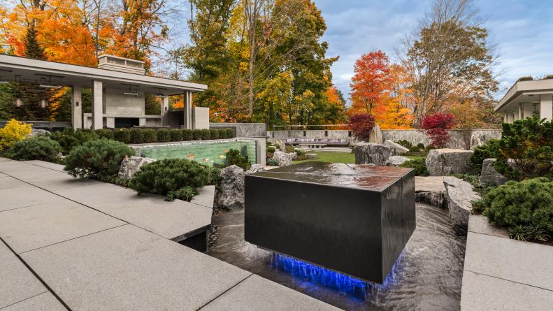 Contemporary Outdoor Living Space With Water Feature